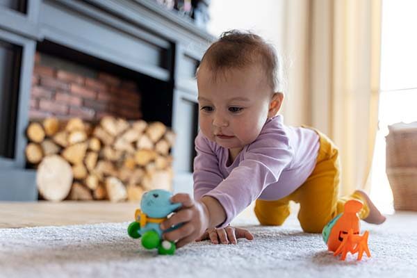 adorable baby playing with toy