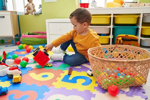 boy playing on floor